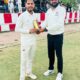 Rohit Pandey receiving man of the match award